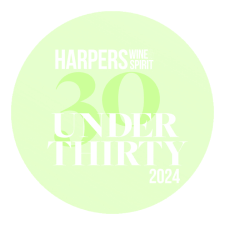 Green circular badge with white text reading 'HARPERS BAZAAR 30 UNDER 30 2024'.